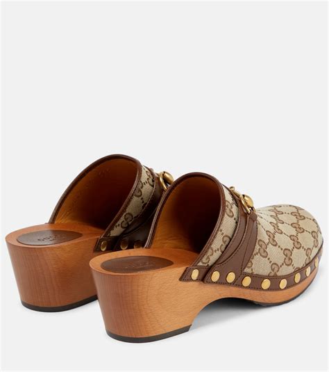 golden gucci clogs|Gucci clogs for men.